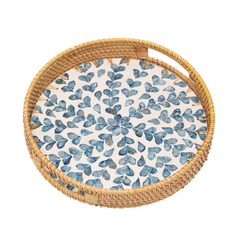 Volubia - Plateau rond en rotin et nacre fait main, motif feuillage volubile sur fond transparent – Produit artisanal fait à la main · Kuênia