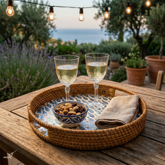 Escalia - Round tray in handmade rattan and mother-of-pearl, fish school pattern – lifestyle view – Handcrafted product, handmade · Kuênia